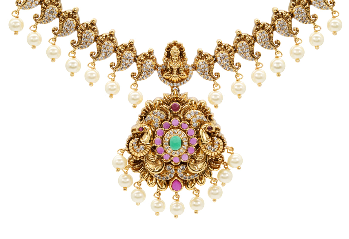 Antique Gold Polish Temple Necklace Set with Green Stone Accents